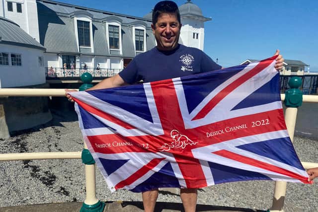 Dad-of-two Phil Warren has become the first person ever to swim across the Bristol Channel using only breaststroke despite suffering with severe hypothermia during the crossing.