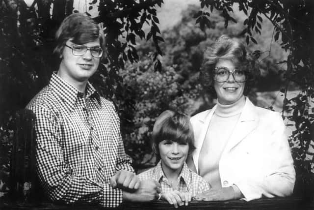Jeffrey Dahmer (left) poses with his mother, Joyce Flint, and younger brother, David (Photo: Milwaukee Journal Sentinel/Joyce Flint)