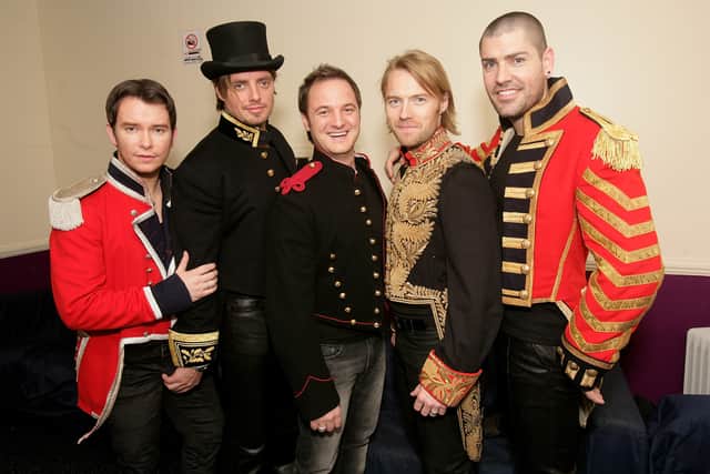 Boyzone members (L-R) Stephen Gately, Keith Duffy, Mikey Graham, Ronan Keating and Shane Lynch pose backstage prior to their pre-tour gig, their first show together in 8 years, at G.A.Y. on March 1, 2008 in London, England.  (Photo by Getty Images)