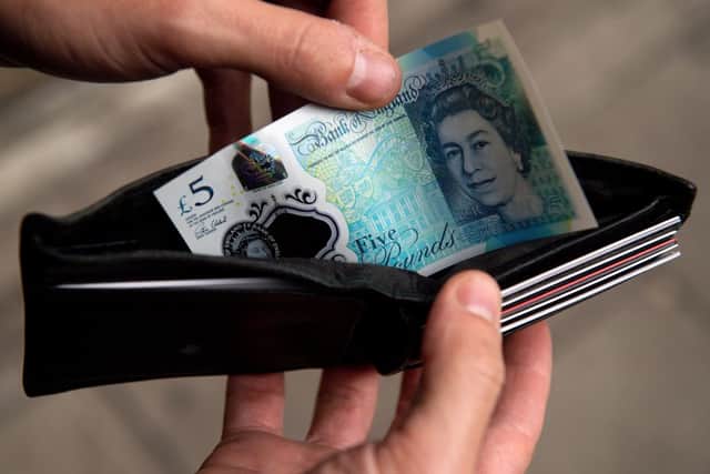 The value of the pounds in our pockets is eroded by inflation (image: AFP/Getty Images)