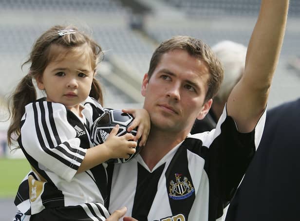<p>Newcastle United's new signing Michael Owen carries his daughter, Gemma, as he is introduced to the fans at St James' Park on August 31, 2005 in Newcastle, England.  (Photo by Alex Livesey/Getty Images)</p>
