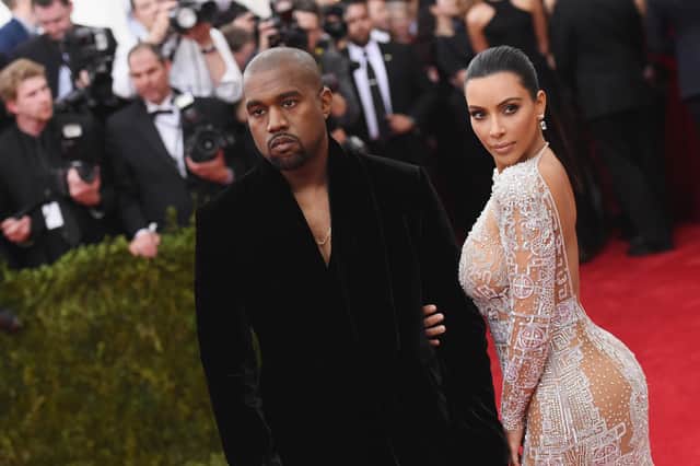 Kanye West (L) and Kim Kardashian attend the "China: Through The Looking Glass" Costume Institute Benefit Gala at the Metropolitan Museum of Art on May 4, 2015