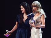  Lana Del Ray presents Taylor Swift with the award for Best Female onstage at the MTV EMA's 2012 at Festhalle Frankfurt on November 11, 2012 in Frankfurt am Main, Germany.  (Photo by Andreas Rentz/Getty Images for MTV)