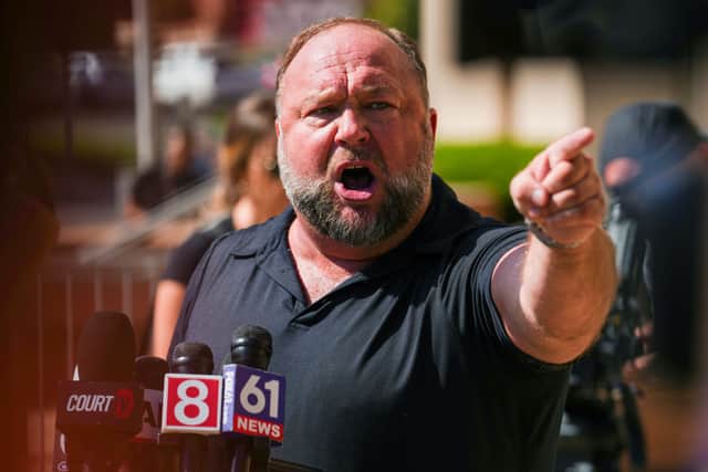 Alex Jones speaks to the media outside Waterbury Superior Court during his trial on September 21, 2022 in Waterbury, Connecticut (Photo by Joe Buglewicz/Getty Images)