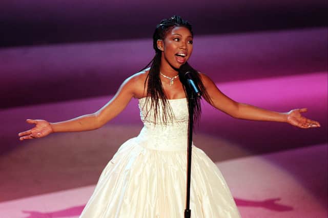  Singer Brandy performs during the 50th Annual Prime time Emmy Awards at the Shrine Auditorium in Los Angeles. (Photo credit: GERARD BURKHART/AFP via Getty Images)