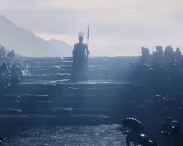 Sauron, in his distinctive spiky armour, ascending stone steps in The Lord of the Rings: The Rings of Power (Credit: Amazon Studios)