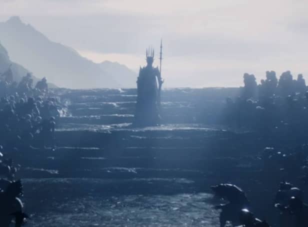 <p>Sauron, in his distinctive spiky armour, ascending stone steps in The Lord of the Rings: The Rings of Power (Credit: Amazon Studios)</p>