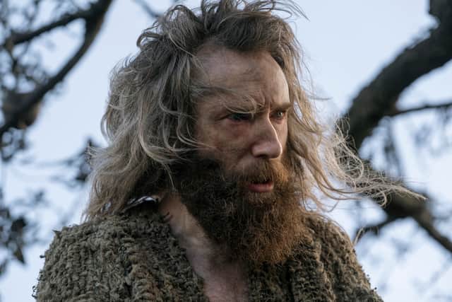 Daniel Weyman as the Stranger in The Rings of Power, bearded and bedraggled (Credit: Ben Rothstein/Prime Video)