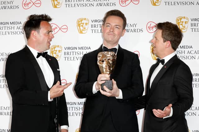  Anthony McPartlin, Stephen Mulhern and Declan Donnelly, winners of the Entertainment Programme award for "Ant & Dec's Saturday Night Takeaway", pose in the press room at the Virgin Media British Academy Television Awards at The Royal Festival Hall on May 08, 2022 in London, England. (Photo by Tristan Fewings/Getty Images)