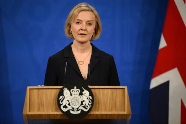 Prime Minister Liz Truss holds a press conference in the Downing Street Briefing Room on October 14, 2022 in London, England. (Photo by Daniel Leal-WPA Pool/Getty Images)