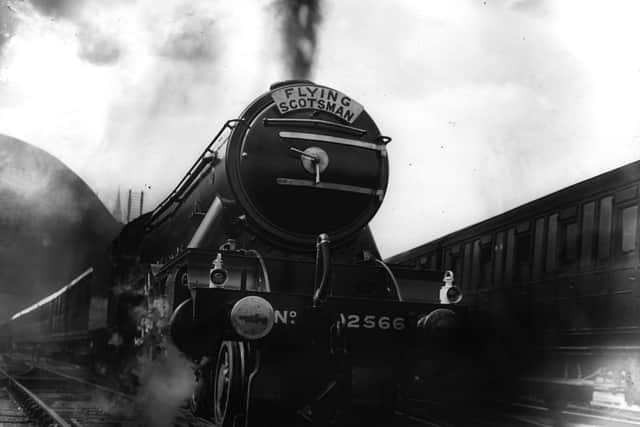 The locomotive engine the Flying Scotsman leaving King’s Cross Station in 1929 (Getty Images)