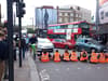 Just Stop Oil protests: public clash with activist blocking Shoreditch High Street in London
