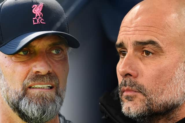 Liverpool manager Jurgen Klopp (L) and Pep Guardiola, Manager of Manchester City (R). (Photo by Michael Regan/Getty Images)