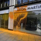 An Aston Martin car showroom on Park Lane in central London which has been sprayed with paint by Just Stop Oil protesters. Picture: PA