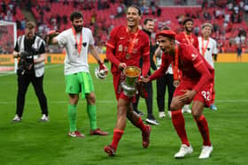 Liverpool’s Virgil van Dijk and Joel Matip celebrate FA Cup win in May 2022