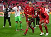 Liverpool’s Virgil van Dijk and Joel Matip celebrate FA Cup win in May 2022