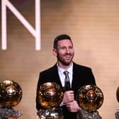 Lionel Messi with six of his seven Ballon d’Or trophies in 2019