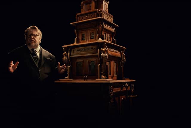 Guillermo del Toro with his Cabinet of Curiosities, as a Rod Serling-esque narrator (Credit: Netflix)