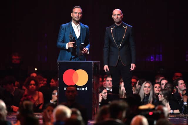 The Bros brothers, Matt Goss and Luke Goss present the British Artist Video Of The Year award during The BRIT Awards 2019 held at The O2 Arena on February 20, 2019 in London, England. (Photo by Gareth Cattermole/Getty Images)