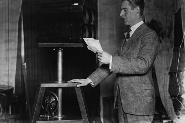 Stanton Jeffries, known as ‘Uncle Jeff’, broadcasting from Marconi House in the early days of the BBC circa 1923 (Credit: Topical Press Agency/Getty Images)