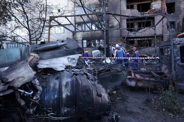 A Russian warplane crashed into an apartment building in the Russian city of Yeysk, killing at least 15 people. (Credit: Getty Images)