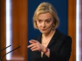 Liz Truss will face questions after being forced to U-turn on her entire economic strategy (Photo: Getty Images)