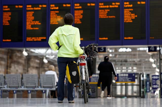 Passengers make their way through Glasgow Central station as a nationwide strike called by the RMT Union was held on July 27, 2022 in Glasgow, Scotland  (Photo by Jeff J Mitchell/Getty Images)