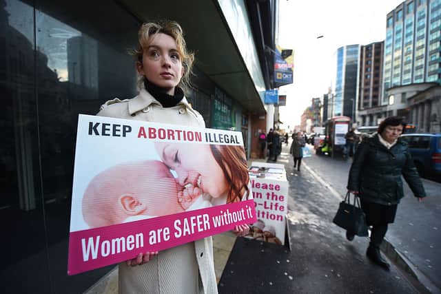 A pro-life activist protests outside an abortion clinic in Belfast. (Getty Images)