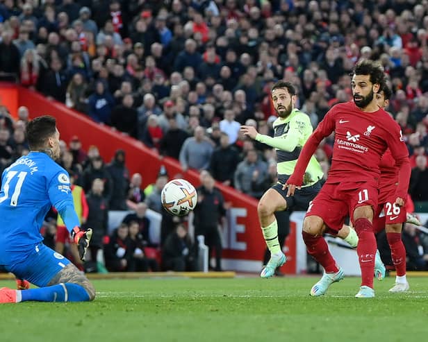 Mohamed Salah scores for Liverpool during fixture against Man City