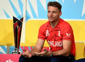 Jos Buttler at T20 World Cup press conference with trophy behind him