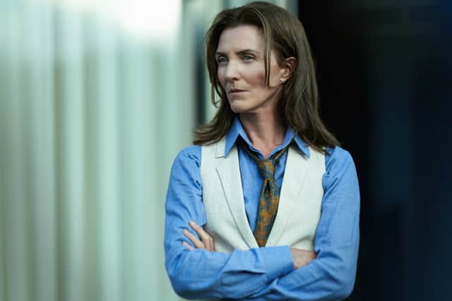 Michelle Fairley as Marian Wallace in Gangs of London, wearing a blue shirt and a white waistcoat (Credit: Sky UK/AMC)