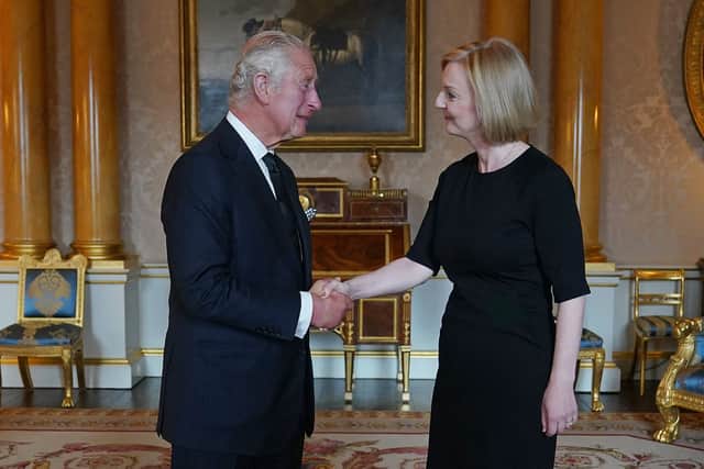 King Charles III greets Prime Minister Liz Truss