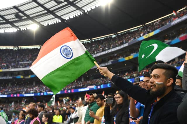 MELBOURNE, AUSTRALIA - OCTOBER 23: Fans show their support during the ICC Men's T20 World Cup match between India and Pakistan at Melbourne Cricket Ground on October 23, 2022 in Melbourne, Australia. (Photo by Quinn Rooney/Getty Images)