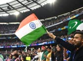 MELBOURNE, AUSTRALIA - OCTOBER 23: Fans show their support during the ICC Men's T20 World Cup match between India and Pakistan at Melbourne Cricket Ground on October 23, 2022 in Melbourne, Australia. (Photo by Quinn Rooney/Getty Images)