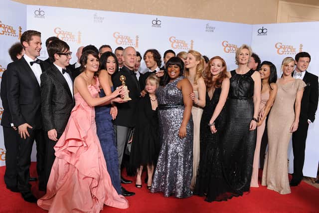 Cast and crew of Glee pose with the award for Best Television Series (Comedy or Musical) at the 68th Annual Golden Globe Awards in 2011 (Pic: Getty Images)