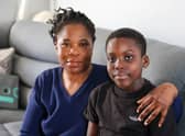 Christine Borton with her son Dayjanta Samuels. See SWNS story SWLNpresents. Cost of living crisis laid bare after mum heartbreakingly reveals her son won't be getting any Christmas presents this year