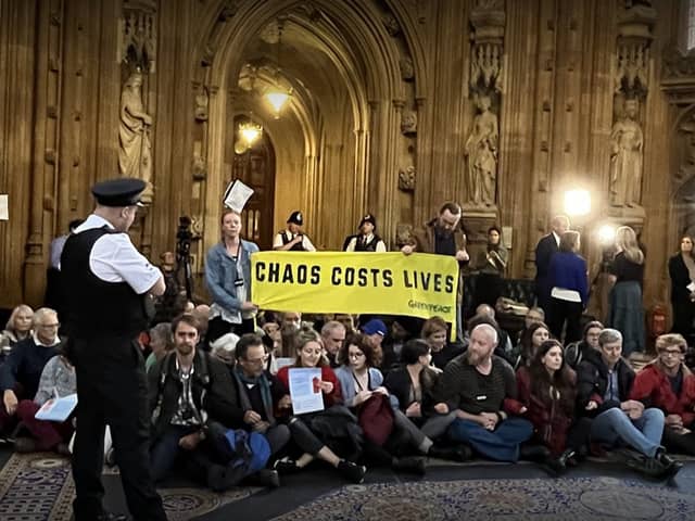Greenpeace protesters staged a sit-in inside the Houses of Parliament following Rishi Sunak’s selection as Prime Minister. (Credit: Greenpeace/Twitter)