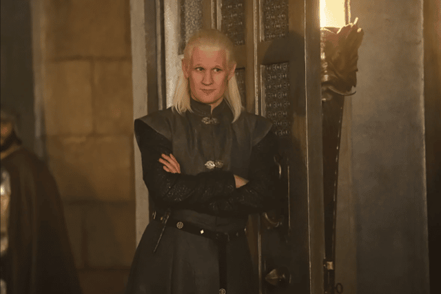 Matt Smith as Daemon Targaryen in House of the Dragon, smirking from the sidelines (Credit: HBO)