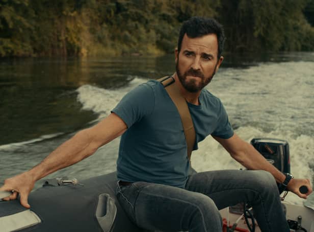 Justin Theroux as Allie Fox in The Mosquito Coast, riding a speed boat (Credit: Apple TV+)