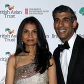 Rishi Sunak with his wife Akshata Murthy, whose father owns a multi-billion pound IT firm (AFP via Getty Images)