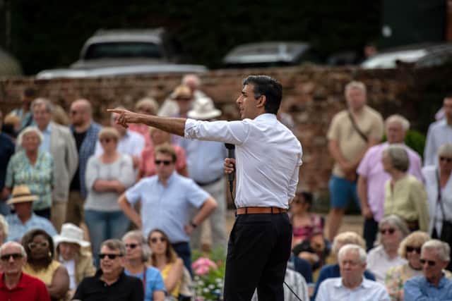 Rishi Sunak speaks to a crowd during his campaigning at Manor Farm in Ropley, near Winchester,  on 30 July 2022 (Photo: Chris J Ratcliffe - Pool/Getty Images)