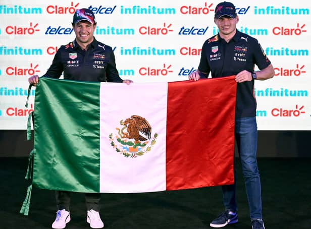 <p>Sergio Perez (L) and Max Verstappen hold Mexican flag ahead of Mexican GP this weekend</p>