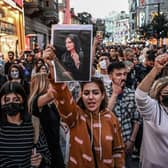 Protests have broken out around the world against Iran’s treatment of women, following the death of 22-year-old Mahsa Amini in police custody. (Credit: Getty Images)