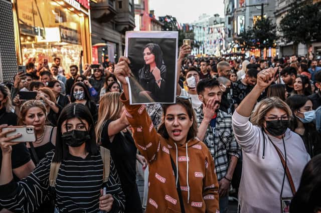 <p>Protests have broken out around the world against Iran’s treatment of women, following the death of 22-year-old Mahsa Amini in police custody. (Credit: Getty Images)</p>