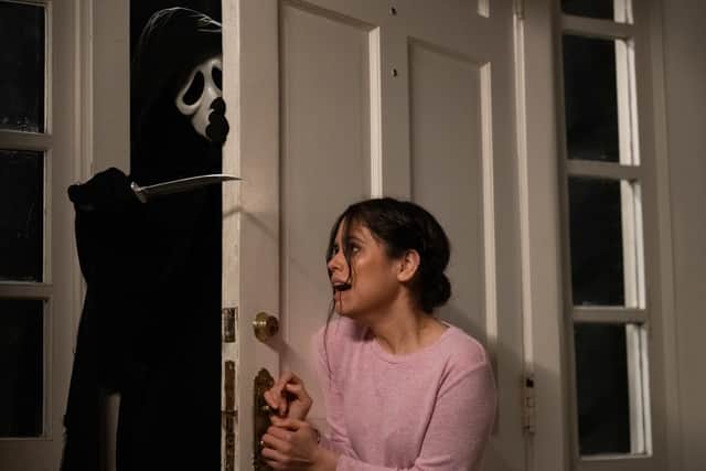 Ghostface and Jenna Ortega as Tara  (PA Photo/Paramount Pictures/Brownie Harris)