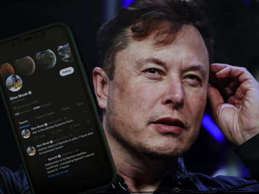 Elon Musk’s twitter profile is displayed on a mobile phone and the image of him is seen on a computer screen on back of it ( is displayed on a mobile phone and the image of him is seen on a computer screen on back of it in Ankara, Turkiye on October 06, 2022. Muhammed Selim Korkutata / Anadolu Agency)