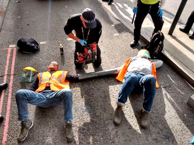 Just Stop Oil protesters glue and bolt themselves to roads. Credit: Just Stop Oil