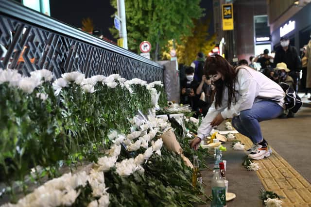 People are mourning their loved ones in Seoul (image: Getty Images)