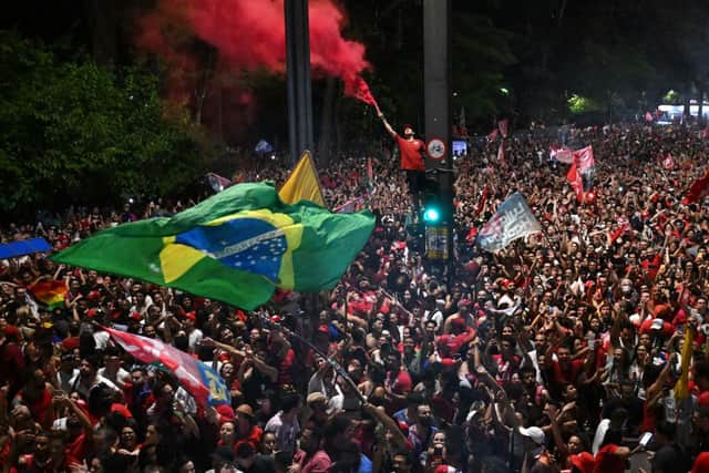  Supporters of president-elect Luiz Inacio Lula da Silva listen to his speech at the Paulista avenue (Photo: Getty Images)