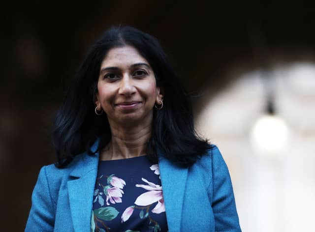 Home Secretary Suella Braverman is under fire for breaking the ministerial code and her migrant centre policy. Credit: Dan Kitwood/Getty Images